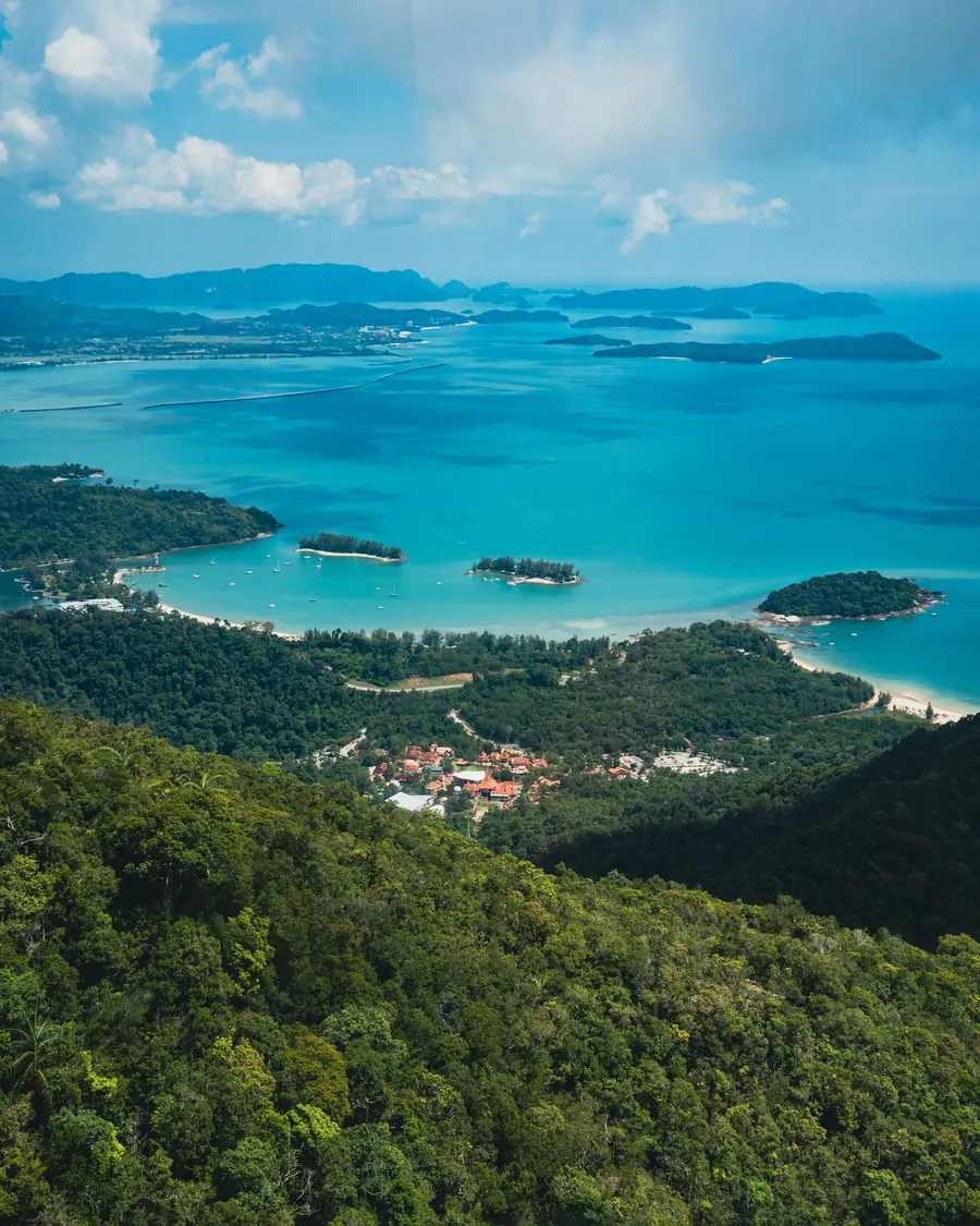 Turquoise bays and small islands seen from the forested hills of Langkawi